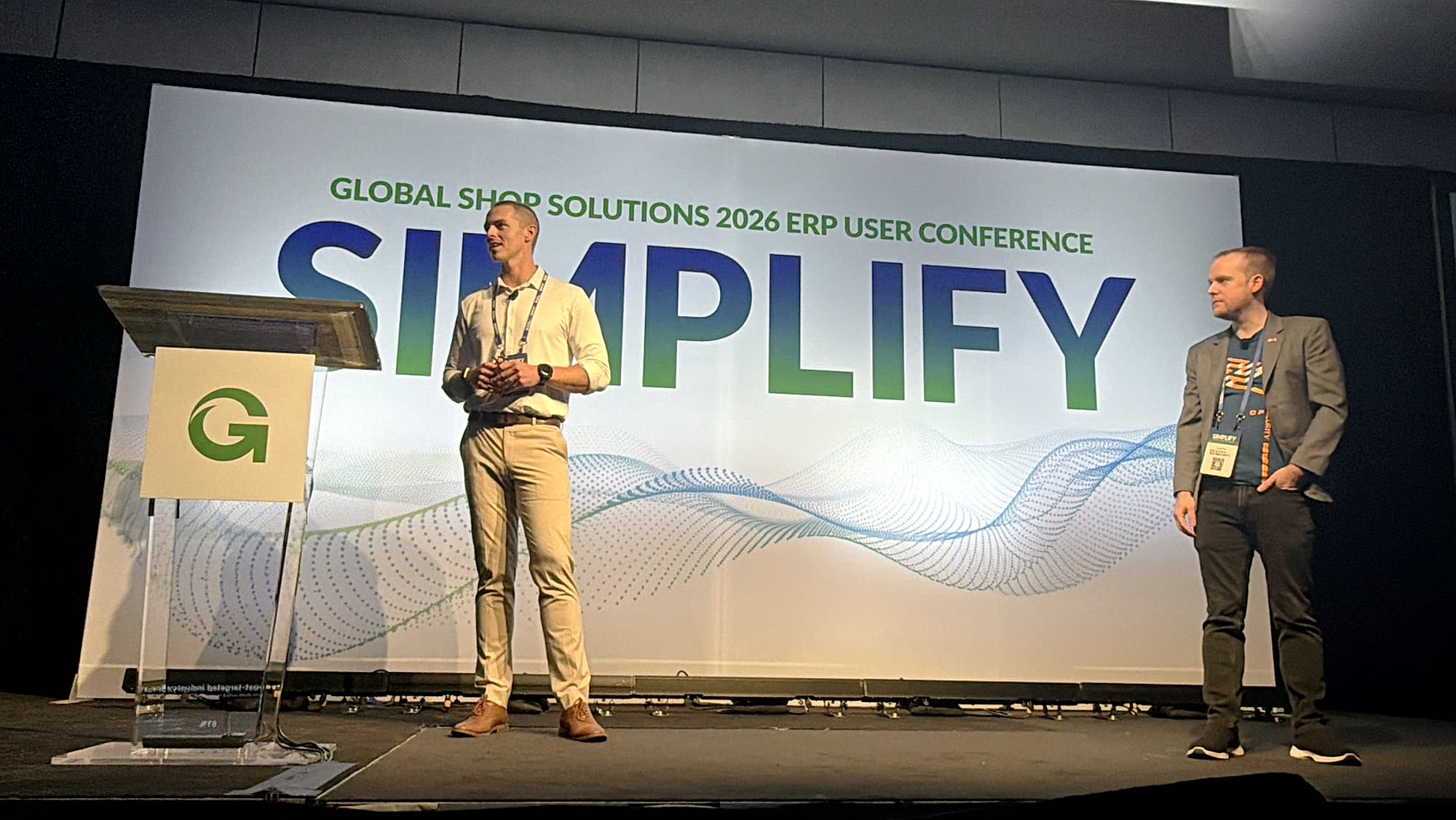 Open Security and Global Shop Solutions presenters on the Simplify 2026 stage